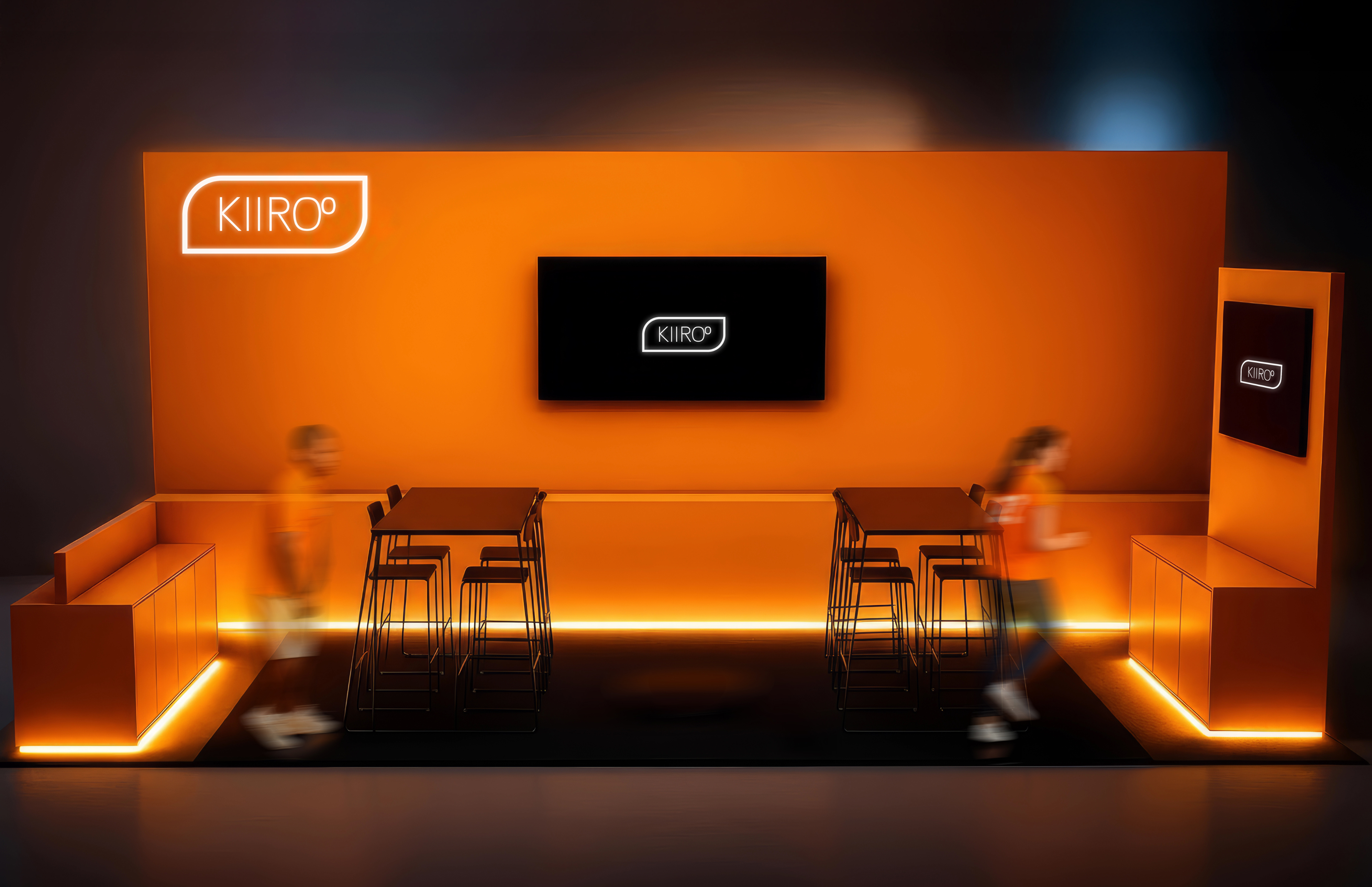 Wide view of the orange Kiiroo booth