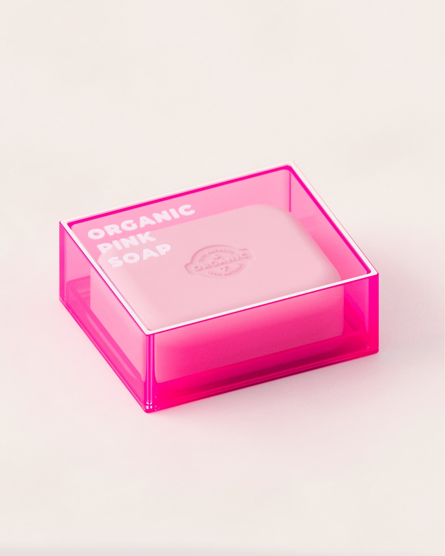 Pink transparent box containing organic pink soap